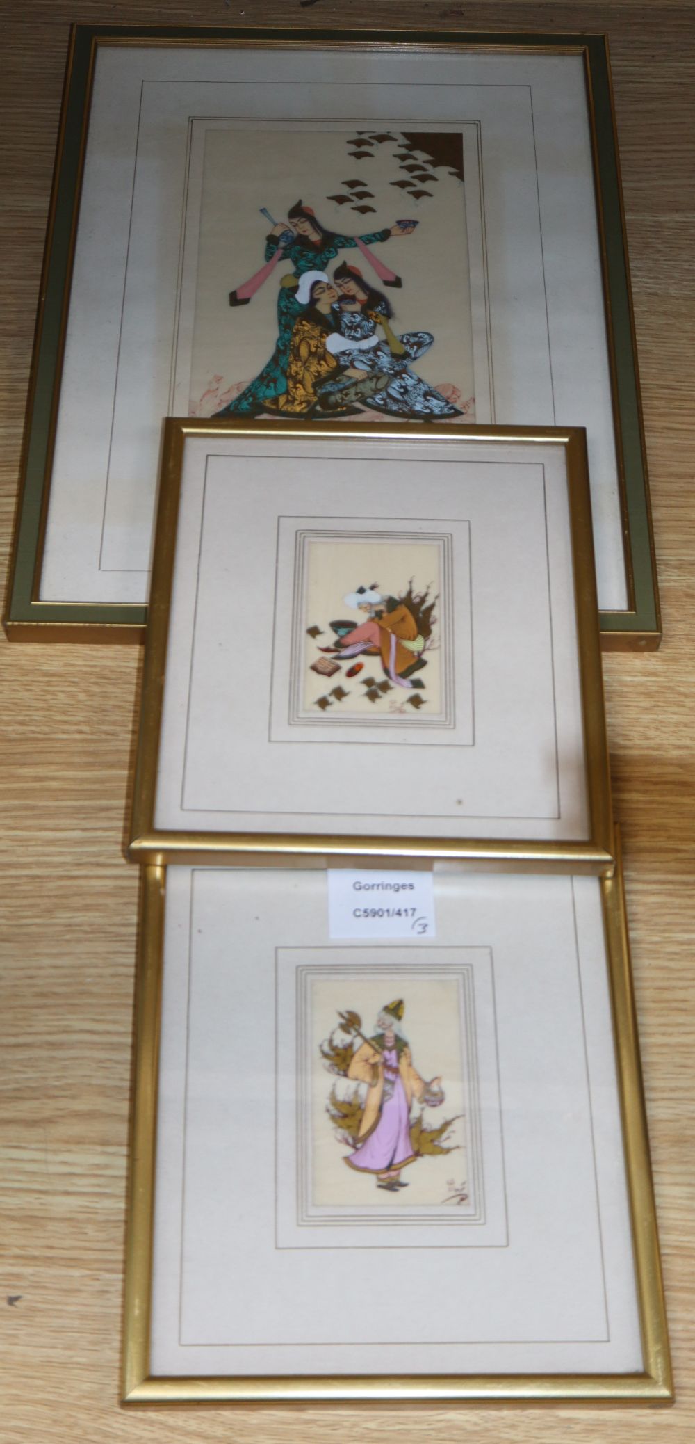 Persian School, three gouache miniatures, two signed, largest 23 x 13cm